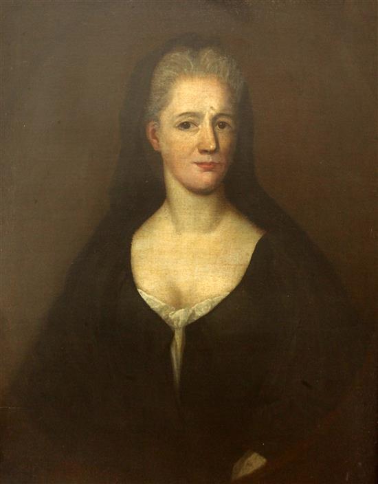 Mid 18th century English School Portrait of a lady wearing a black dress 29.5 x 24.5in.